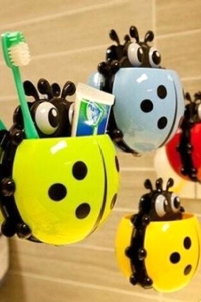 Dụng cụ đựng kem và bàn chải đánh răng hình cánh cam ngộ nghĩnh